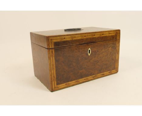 George III amboyna and inlaid tea caddy, circa 1800, rectangular form bordered with inlaid foliate trails and with original e