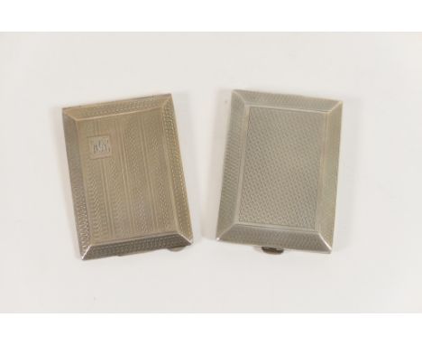 George V silver match case, London 1928, rectangular form with engine turned decoration, 6cm; also a further silver match cas