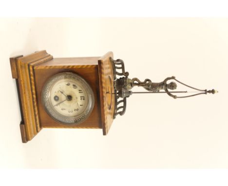 German walnut novelty mantel clock by Junghans, the case enclosing a silvered dial with Arabic numerals, keywind movement sur