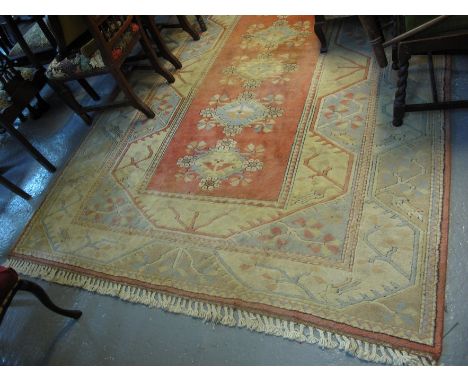 Large Middle Eastern design beige and salmon carpet, the central floral field and other floral and geometric decoration. 301 