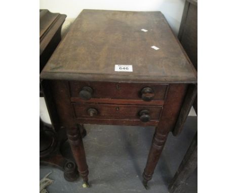 Victorian mahogany drop-leaf lady's work table on ring turned legs and casters.(B.P. 24% incl. VAT)
