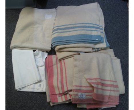 Two boxes of vintage blankets and textiles to include; three cream blankets with pink striped edges (one labelled 'Early Warm