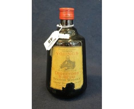 Young's directors special Scotch whisky, 70% proof, sealed. (B.P. 24% incl. VAT) CONDITION REPORT: Damage to the label and an