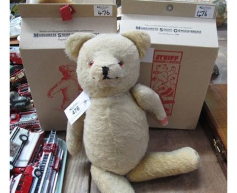 Modern boxed Steiff cat, together with a modern boxed Steiff fox, together with a mid 20th Century teddy bear. (3)(B.P. 24% i