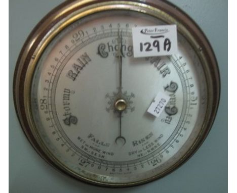 Small oak cased aneroid barometer. (B.P. 24% incl. VAT)