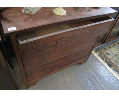 Early 20th Century oak straight front chest of three long drawers on bracket feet. (B.P. 24% incl. VAT)