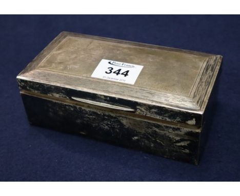 Silver rectangular cigarette box with hinged cover having engine turned band, two compartments to the interior. Birmingham ha