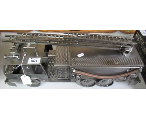 Unusual scratch built model of an American style fire engine made from recycled steel and other parts to include; bolts, wash