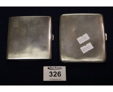 Two silver engine turned cigarette cases, 7 troy ozs approx. (B.P. 24% incl. VAT)
