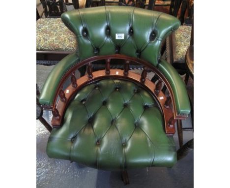 Reproduction green leather button back and mahogany Captain's chair. (B.P. 24% incl. VAT)