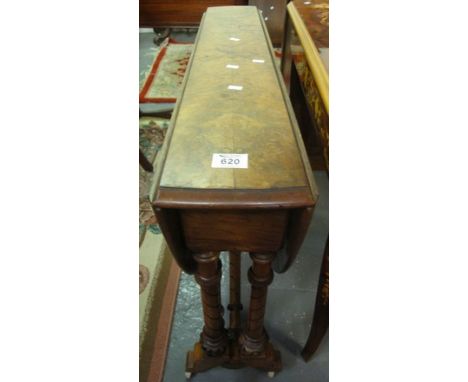 Late Victorian walnut drop-leaf table on turned supports and ceramic casters. (B.P. 24% incl. VAT)