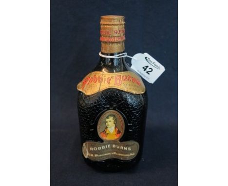 Robbie Burns famed old Scotch whisky, bottled by R.H Thompson & Co distillers Ltd, Leath, Scotland. In dimpled decanter, seal
