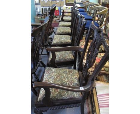 Set of six mahogany Chippendale style dining chairs having floral and foliate stuff over seats with shaped front and cabriole