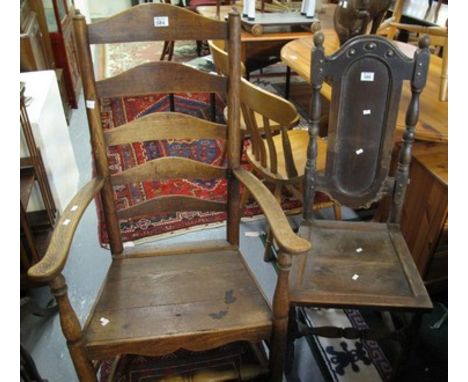 Early 20th Century oak high ladder back open armchair, together with a 19th Century stained high back hall chair. (2)(B.P. 24