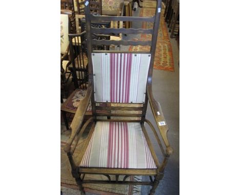 Arts and Crafts design oak high ladder back type upholstered armchair. (B.P. 24% incl. VAT)
