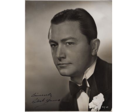  CINEMA: Two photograph albums (oblong 4to and large 4to) containing over 60 vintage signed 5 x 7 photographs and slightly la