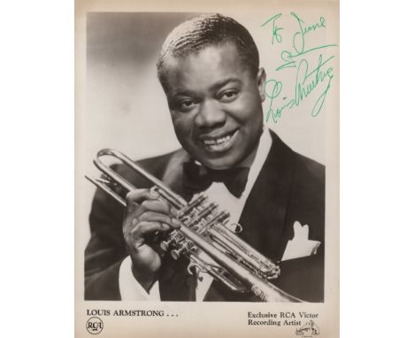  ARMSTRONG LOUIS: (1901-1971) American Jazz Trumpeter. A good vintage signed and inscribed 8 x 10 photograph of Satchmo in a 