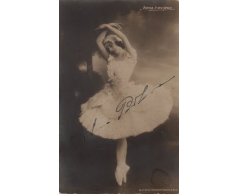 PAVLOVA ANNA: (1881-1931) Russian Ballet Dancer. Vintage signed sepia postcard photograph of Pavlova standing en pointe in an