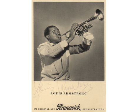  ARMSTRONG LOUIS: (1901-1971) American Jazz Trumpeter. Vintage signed postcard photograph, the image depicting Armstrong stan