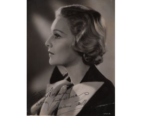  CINEMA: A large 4to photograph album containing over 25 vintage signed 8 x 10 photographs and slightly smaller by various fi