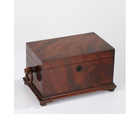 William IV mahogany tea caddy, the hinged lid enclosing a two compartment interior, loop carrying handle either side and rais