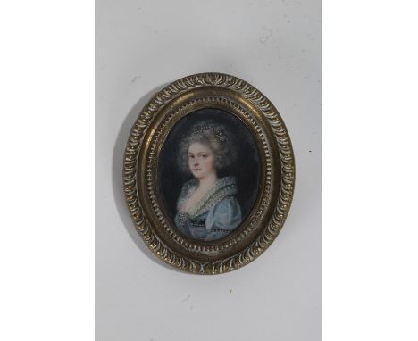 Miniature portrait of an 18th Century lady, possibly Marie Antoinette, wearing a blue dress against a black ground, oil on bo