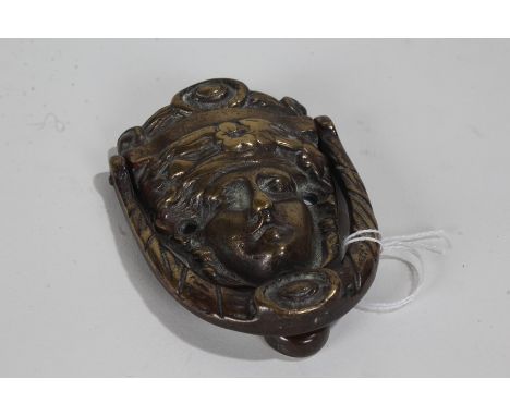 20th century brass figural door knocker, 9cm high