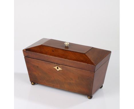 George IV mahogany sarcophagus tea caddy, having ivory finial and escutcheon, the hinged lid enclosing a fitted interior, rai