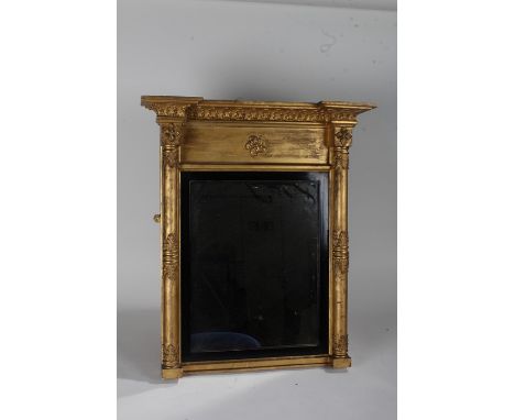 Regency gilded wooden pier mirror, having moulded breakfront cornice, above a rectangular plate with floral motif, the mirror