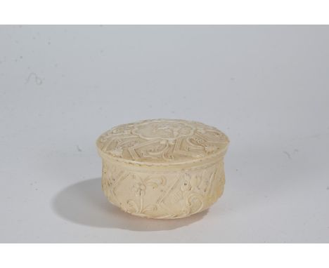 18th century ivory snuff box, circa 1740, the lid with depiction of a figure playing a flute surrounded by fruit and scrolls,