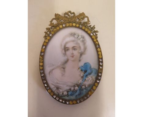 A 19th Century portrait miniature of a lady, indistinctly signed, approx 9cm overall, in good condition 