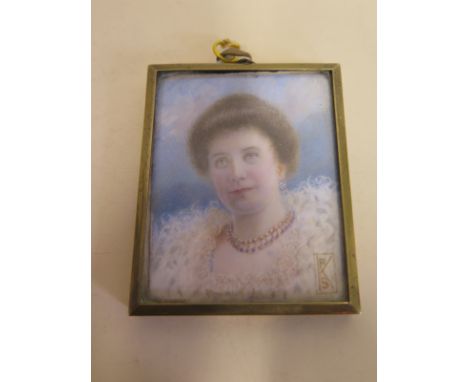 A 19th Century portrait miniature in a square frame, approx 6.4cm x 5cm - in good condition 