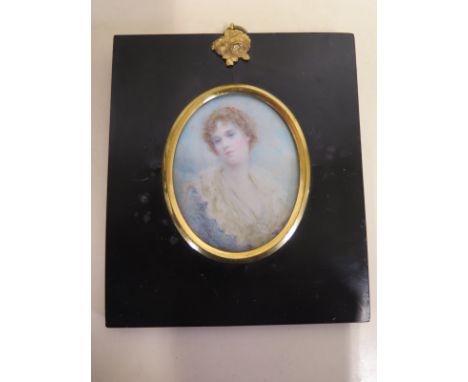 A portrait miniature painting of a lady, signed Alwyn Williams, mounted in an ebonised frame, approx 7cm oval, in good condit