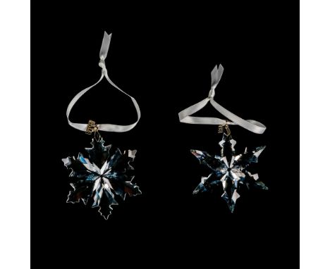 Lead clear crystals part of the Christmas Ornaments collection. They hang on white satin ribbons, with a silver-tone metal ta