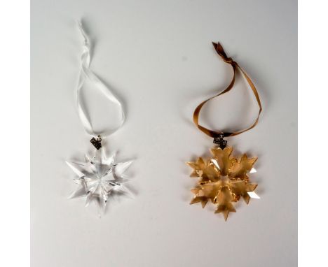Lead clear and golden shadow colored crystals part of the Christmas Ornaments collection. They hang with a brown and white sa
