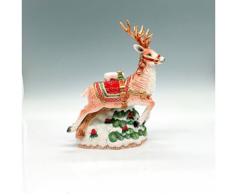 Figural image of a reindeer galloping through a wintery scene. This item has its original box. Fitz and Floyed backstamp. Box