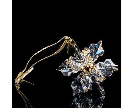 Lead crystal part of the Christmas Ornaments collection, made from clear crystal and hangs on a gold-tone ribbon. Swarovski e