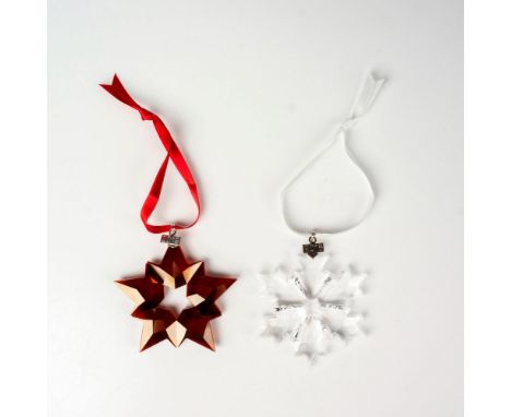 Lead red and clear colored crystals that are part of the Christmas Ornaments collection. They hang on red and white satin rib
