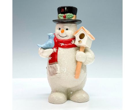 Made of fine china, this carefully hand-painted figurine portrays a snowman accompanied by a charming blue bird. Lenox backst