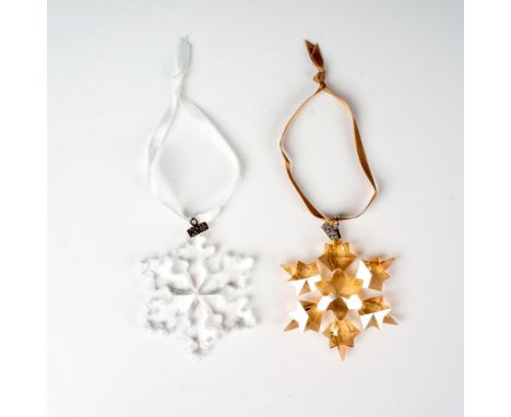 Lead clear crystals part of the Christmas Ornaments collection. They hang on blue and blue satin ribbons. Swarovski etched ba