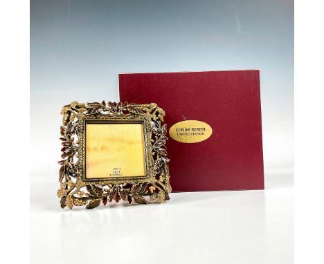 A beautiful museum gold plated frame decorated with enamel leaves and canary yellow crystals. Edgar Berebi impressed plaque o