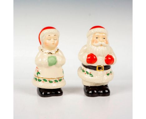 Fine porcelain figural shakers featuring Mr. and Mrs. Claus; gilded accents. Lenox backstamp. Tallest measures: 2.25"L x 2"W 