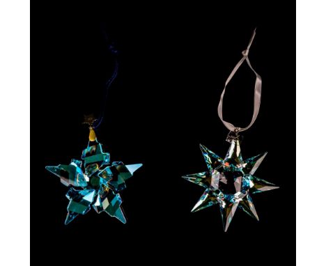 Lead crystals limited edition that are part of the Christmas Ornaments collection. They hang on white satin ribbons. Swarovsk