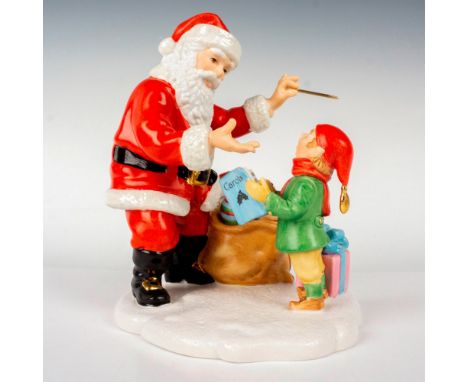 This fun-loving figurine depicts Santa teaching a young caroler to sing, Glossy and bisque finish adorned with gold gilt. Len