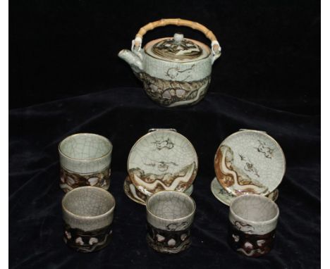 A Japanese or Korean pottery celedon tea wares, comprising tea kettle with bamboo handle, double walled with pierced design; 