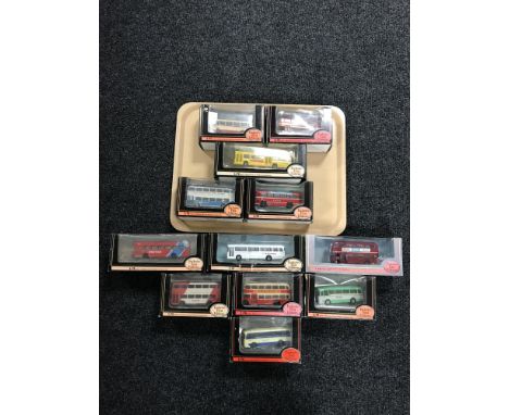 A tray of twelve boxed Exclusive First Edition die cast buses, boxed 