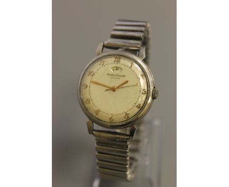 A Gents Stainless Steel Jaeger LeCoultre Automatic Centre Seconds Wristwatch with Power Reserve Indication, the silvered dial