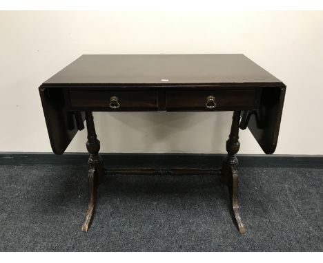 A mahogany sofa table fitted two drawers 