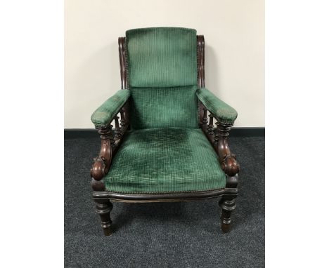 A Victorian mahogany armchair in green fabric  CONDITION REPORT: Frame with typical scuffs, scratches and watermarks. Seat wi