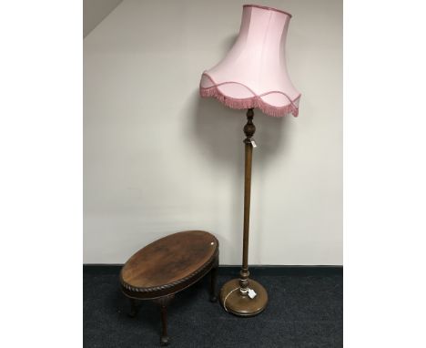 A mahogany coffee table and an oak standard lamp and shade 